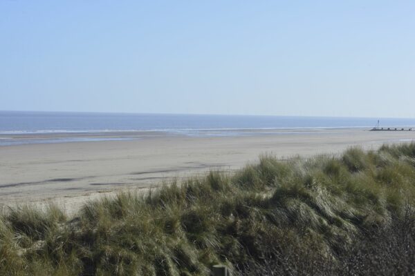 Mablethorpe beach and sea in the background and sand dunes in the foreground