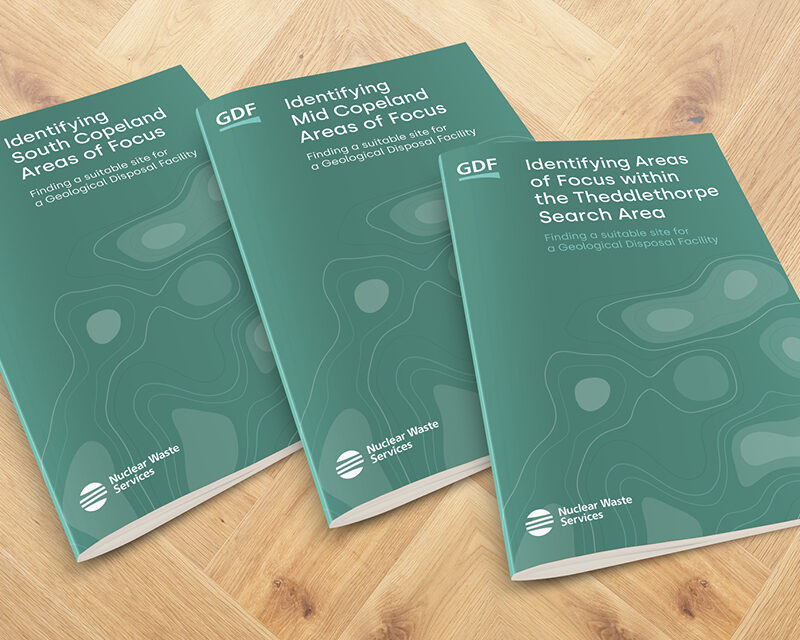 Image of three green coloured Areas of Focus brochures laid out on a table